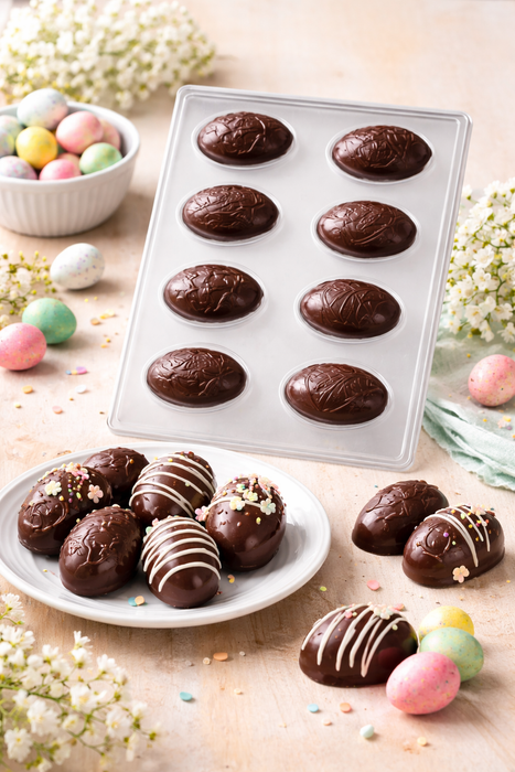 decorative chocolate eggs made using fancy egg candy mold for Easter treats and dessert decoration